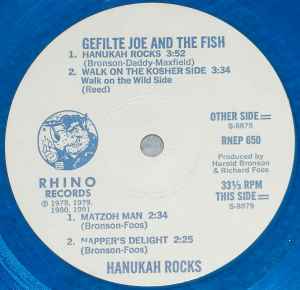 Image of Back Cover of 12" - VG/G+ - GEFILTE JOE AND THE FISH, Hanukah Rocks (Rhino Records; RNEP 650, US 1981, Clear Plastic Stickered Sleeve, Translucent blue vinyl star shaped picture disc.), ,  - 0126004E