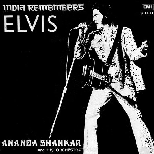 Image of Front Cover of 7" - G+/G - ANANDA SHANKAR AND HIS ORCHESTRA, India Remembers Elvis (His Master's Voice; S/7EPE. 3201, India 1978, Picture Sleeve, Solid Centre), Disc has a small tight crack that stays together, plays through fine. Sleeve is frail and shows damage near the opening, stains on back.,  - 0116306C