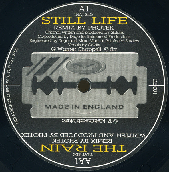 Image of Front Cover of 12" - G+/G+ - GOLDIE / PHOTEK, Still Life / The Rain (Photek Remixes) (Razors Edge; RE 001, UK 1996, Die Cut Company Sleeve), Lots of scuffs, marks and hairlines. Sleeve has creasing and ringwear.,  - 1516134C