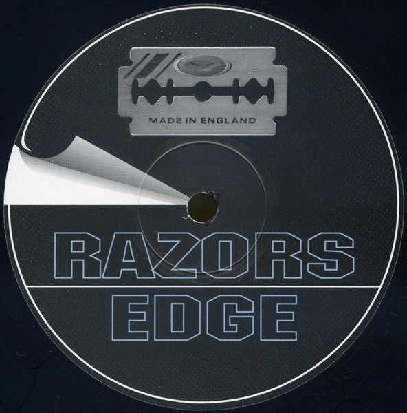 Image of Back Cover of 12" - G+/G+ - GOLDIE / PHOTEK, Still Life / The Rain (Photek Remixes) (Razors Edge; RE 001, UK 1996, Die Cut Company Sleeve), Lots of scuffs, marks and hairlines. Sleeve has creasing and ringwear.,  - 1516134C