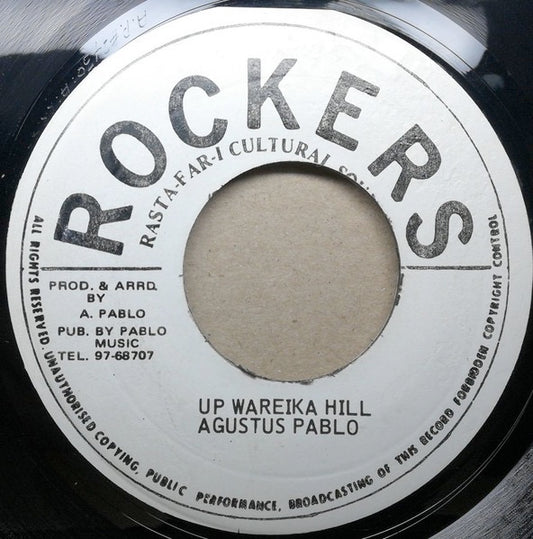 Image of Front Cover of 0216133C: 7" - AUGUSTUS PABLO, Up Wareika Hill (Rockers; , US 1974) Lots of light marks, plays above grade; light background only.  /G+