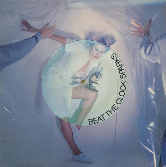 Image of Front Cover of 0246253S: 12" - SPARKS, Beat The Clock (Virgin; VS27012, UK 1979, Die Cut Picture Sleeve, Black vinyl outside edge with picture disc central area) Still on opened shrinkwrap  VG+/VG+