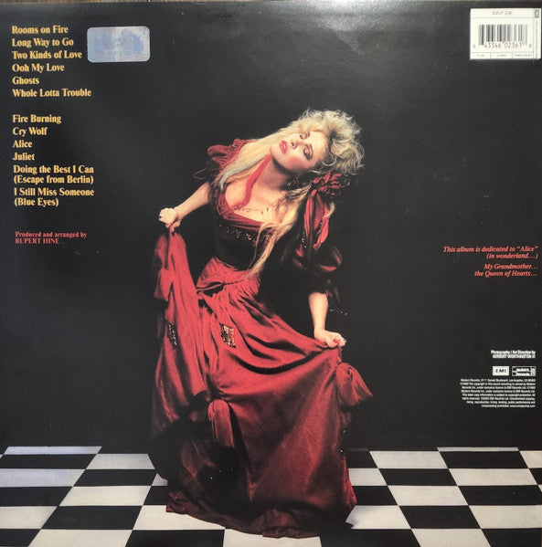 Image of Back Cover of 0526209E: LP - STEVIE NICKS, The Other Side Of The Mirror (Modern Records; 91245-1, UK 2000 Reissue, Insert, Limited Edition 180g vinyl) Sleeve has ringwear, small indentations and creases.  VG/VG+