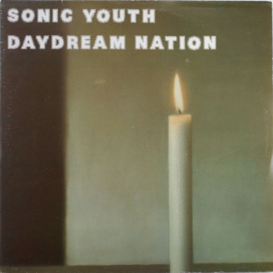 Image of Front Cover of 0526366E: LP - SONIC YOUTH, Daydream Nation (Blast First; BFFP 34, UK 1988, Gatefold, 2 White Inners, No Poster, Early versions of 1st pressing have 2 White inners, not printed inners.) Original issue with 2 white inners (printed inners came later). Disc 1 is VG with some light hairlines. Disc 2 is VG+. Sticker removal area on sleeve where gloss has been removed with sticker.  VG/VG