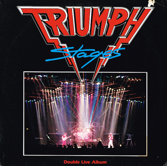 Image of Front Cover of 2xLP - VG/VG - TRIUMPH, Stages (MCA Records; MCA2-8020, US 1985, Gatefold), Strong VG all around. Scuffs and hairlines. Notch cut to lower part of spine, ring and edge wear.,  - 0846382S