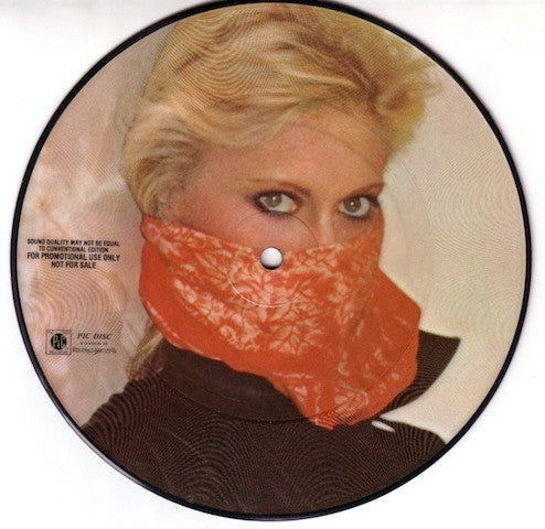 Image of Front Cover of 7" - VG+/VG+ - OLIVIA NEWTON-JOHN, Deeper Than The Night / Please Don't Keep Me Waiting (MCA Records ; PICS45-1810, US 1979, Promo, Plastic Sleeve, No Insert, Picture Disc), ,  - 0926399E