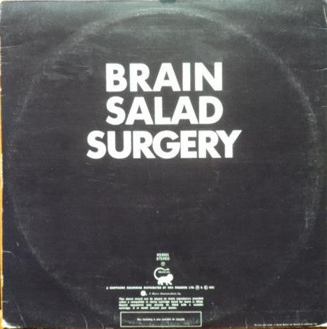 Image of Back Cover of LP - VG/VG+ - EMERSON, LAKE & PALMER, Brain Salad Surgery (Manticore; K 53501, UK 1970s Reissue, Fold Out Sleeve, No Poster), Small circle of sticker damage to sleeve,  - 1416112C