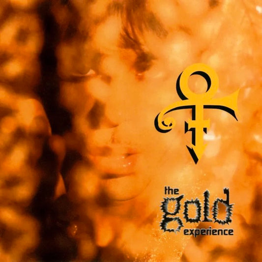 Image of Front Cover of 2xLP - EX/VG+ - PRINCE, The Gold Experience (Sony; 19439935961, UK 2023 Reissue, 2 Inners), Still In Stickered Shrinkwrap, The Gold Experience was the first full length Prince album to be credited to his unpronounceable symbol and was released at the most public, heated stage of his battle with the major label industrial complex. With the word  SLAVE  written on one cheek, Prince shone on the opulent ballads  The Most Beautiful Girl in the World  and  Gold , was defiant on the single