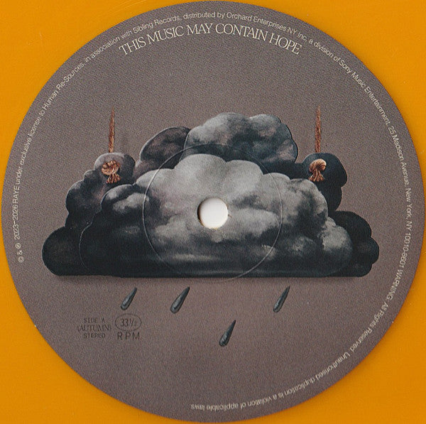 Image of Label Cover of 2xLP - NEW/NEW - RAYE, THIS MUSIC MAY CONTAIN HOPE. (Human Re Sources; TMMCHLP1, Europe 2026, Gatefold, 2 Inners & Booket, Yellow 'Marigold' Vinyl. Die Cut Sleeve), , Four-time GRAMMY Award-nominated global superstar RAYE, is releasing her highly anticipated sophomore album THIS MUSIC MAY CONTAIN HOPE. The album, set in 4  seasons  with each side of the vinyl being a different season, takes listeners on a sonic journey that begins with darkness and ends with light. Music is medicin