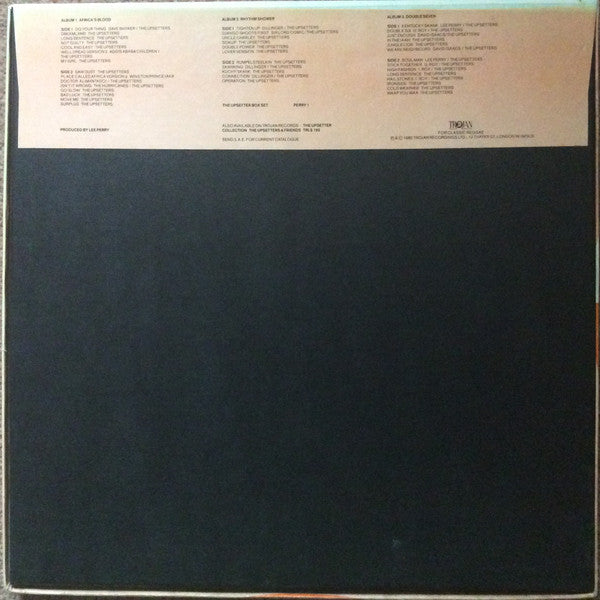 Image of Back Cover of 3xLP - VG/VG+ - LEE 'SCRATCH' PERRY, THE UPSETTERS & FRIENDS, The Upsetter Box Set (Trojan Records; PERRY 1, UK 1985, Box Set, 3 Inners, Limited Edition, No Barcode, White/Blue Labels), Light edge and corner wear to box. Strong seams. Nice clean discs.,  - 1046147S