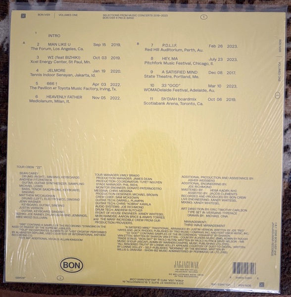 Image of Back Cover of LP - NEW/NEW - BON IVER, VOLUMES: ONE "SELECTIONS FROM MUSIC CONCERTS 2019-2023 BON IVER 6 PIECE BAND (Jagjaguwar; JAG485LP, Europe 2026, Standard Sleeve, Insert), , VOLUMES: ONE, the first non-studio release from Bon Iver, captures 10 distinctive live performances, recorded between 2019 and 2023, showcasing Justin Vernon and his band at their most whole. There s a warmth and exuberance across the album, as well as the sort of muscular sound you can really only get at a live show. For