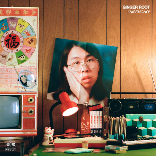 Image of Front Cover of LP - NEW/NEW - GINGER ROOT, Nisemono (Acrophase Records; ACRO1138LP-C1, Europe 2026 Reissue, Blue Vinyl), , Playing further in the conceptual universe of Ginger Root came Nisemono EP. In the universe, Cameron is now writing and producing for a new Japanese Idol named Kimiko Takeguchi. At the last minute before Kimiko debuts on national TV, she quits and Cameron is thrust into the spotlight to perform the song  Loneliness  which launches him into stardom. This cycle included music v