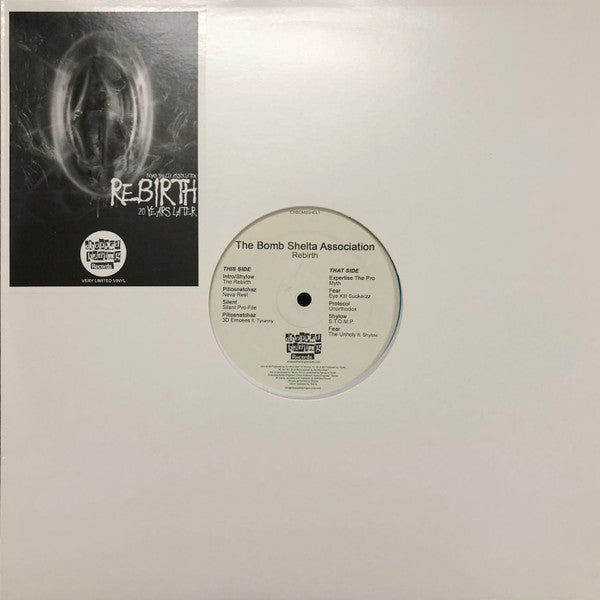 Image of Front Cover of 12" EP - /G - THE BOMB SHELTA ASSOCIATION, Rebirth (Chopped Herring Records; CHBOM8SHEL1, UK 2019, Stickered Plain Sleeve, Aqua Vinyl), A deep mark on track A3 clicks lightly when played through, A1	Shylow   Intro / The RebirthA2	Pillosnatchaz   Neva RestA3	Silent   Silent Pro-FileA4	Pillosnatchaz   3D EmceesB1	Expertise The Pro   MythB2	Fear   Eye Kill SuckerzzB3	Protocol   UnorthodoxB4	Shylow   S.T.O.M.P.B5	Fear   The Unholy - 1016525C