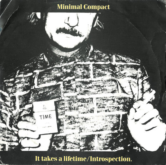Image of Front Cover of 7" - G+/VG - MINIMAL COMPACT, It Takes A Lifetime / Introspection. (Crammed Discs; CRAM 7457, Belgium 1982, Picture Sleeve), Slight crease and rip to cover. ,  - 1156000S