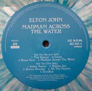 Image of Label Cover of LP - VG+/VG+ - ELTON JOHN, Madman Across The Water (Rocket Entertainment; 657 937-1, Worldwide 2024 Reissue, Clear Plastic Sleeve, Insert, Blue Splatter Vinyl), ,  - 1246006S