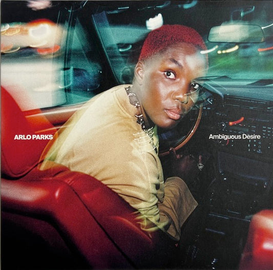 Image of Front Cover of LP - NEW/NEW - ARLO PARKS, Ambiguous Desire (Transgressive; TRANS930XX, Europe 2026, Gatefold, Insert, Poster, Indie Exclusive Marble Blue Vinyl), , Twice GRAMMY-nominated, Mercury Prize and BRIT Award-winning artist Arlo Parks announces her new album, Ambiguous Desire, via Transgressive Records. Ambiguous Desire is Parks at her most confident and experimental, supplanting live band sessions for modular synths, Ableton plugins and samplers that channel the frenetic, vibrant spaces sh