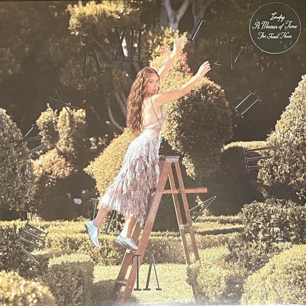 Image of Front Cover of 2xLP - NEW/NEW - LAUFEY, A Matter of Time: The Final Hour (Vingolf Recordings; LAULP3DX, Europe 2026, Watercolour Vinyl), , Laufey s deluxe album, A Matter of Time: The Final Hour, is the closing chapter of her beautiful, critically acclaimed, and GRAMMY  Award-winning third album, A Matter of Time.With four new songs, this 19-track deluxe album is an introspection about learning to live with one s anxieties   embracing uncertainty, accepting the passage of time, and finding calm a