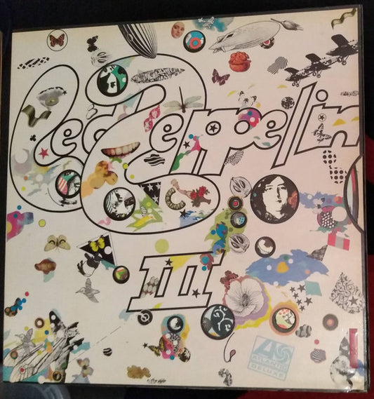 Image of Front Cover of LP - VG/VG - LED ZEPPELIN, Led Zeppelin III (Atlantic Plum & Orange Labels; K 50002, UK 1970s Reissue, Laminated Spinner Gatefold Sleeve With Atlantic K50002 Sticker Inside, Crossover Matrices: Do what thou wilt 2401002 A-5 GHC / 2401002 B//6 420), Strong VG, Clean glossy disc, A handful of wispy hairlines and very light mottling, Laminate bubbling on both sides of sleeve sleeve, Spinner working and intact. , LED ZEPPELIN, Led Zeppelin III (Atlantic Plum & Orange Labels; K 50002, UK 