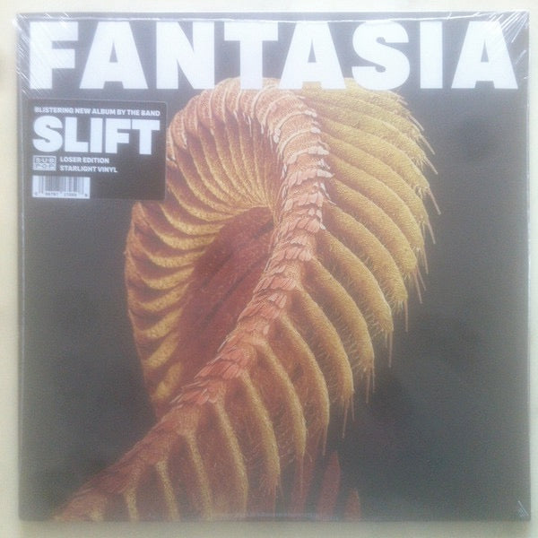 Image of Front Cover of 2xLP - NEW/NEW - SLIFT, Fantasia (Sub Pop; SP1725X, Europe 2026, 2 Inners, Loser Edition Sparkle Starlight Vinyl, Etched 4th Side), , In the technical sense, every previous album by the radiant and heavy French trio SLIFT has been a fantasia a composite of genres and forms that allowed the band to improvise, to jam on themes until they seemed to spiral together into space. Their acclaimed third album, 2024 s Ilion, was a sci-fi story built with 10- to 13-minute exploratory escapades,