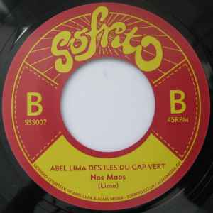 Image of Back Cover of 7" - /VG+ - ABEL LIMA E LES SOFAS / ABEL LIMA DES ILES DU CAP VERT, Corre Riba Corre Baxo / Nos Maos (Sofrito Super Singles; SSS007, UK 2014, Plain Sleeve), Light marks only.,  - 1426113E
