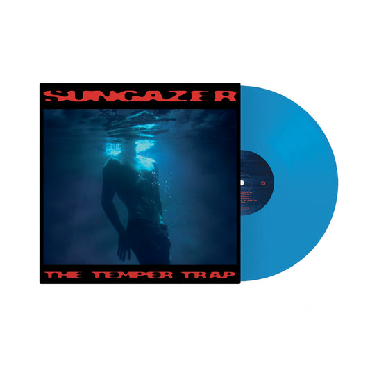 Image of Front Cover of LP - NEW/NEW - THE TEMPER TRAP, Sungazer (Mushroom Music Group; MUSH030LP7, Europe 2026, Gatefold, Blue Vinyl), , The album Sungazer veers from yearning intimacy to full-throttle catharsis, from guitar-riffing indie tunes to heavy electronica, all anchored in Dougy’s expansive, instantly recognisable voice. The band set out to create a record that authentically reflects who they are today, and it unequivocally distills two decades of experience into an album that is as invigoratingly