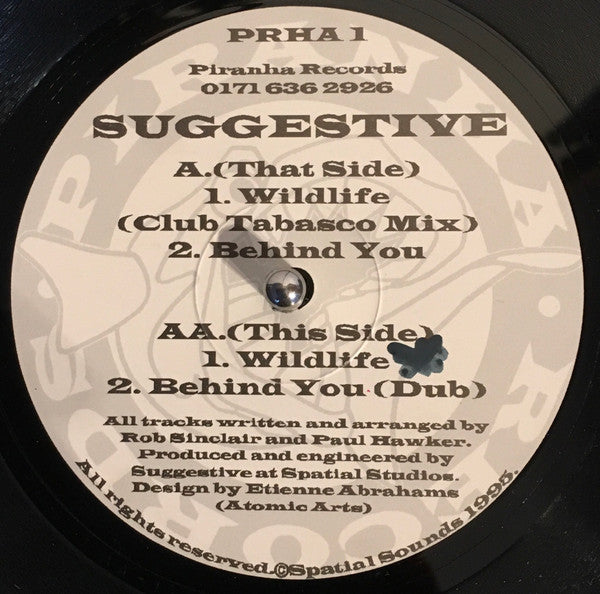 Image of Front Cover of 12" - /VG - SUGGESTIVE, Wildlife (Piranha Records ; PRHA 1, UK 1995), Lighter marks and scuffs on record, A1	Wildlife (Club Tabasco Mix)A2	Behind YouAA1	WildlifeAA2	Behind You (Dub) - 1416497C