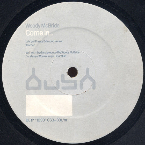 Image of Front Cover of 12" - G+/G+ - WOODY MCBRIDE, Come In... (Bush; Bush 1030, UK 1996, Company Sleeve), Record has some light pressing flaws, marks, scuffs and a blemish. Sleeve worn and damaged at edges, with old sticker and ghost on it, 	A1	Lets get Freaky	A2	TeacherB1	There's still timeB2	Wall Of Confusion - 1416541C