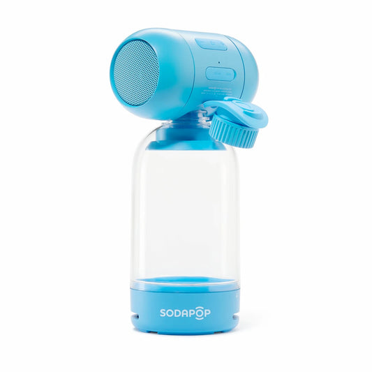 Image of Front Cover of Accessories - NEW/NEW - SODAPOP, Sodapop - Bluetooth Speaker - Skinny Dip (Sodapop; , Europe 2026, High-quality stereo sound engineered for clarity and punch with innovative bass-enhancing design. Compact, lightweight and stylish; perfect for travel, festivals and picnics. Bluetooth 5.0 connectivity for seamless pairing and TWS. Class leading battery life of over 30 hours. Sustainable packaging and free carry pouch.), , Sodapop s unique and protected design is a world-first in portab