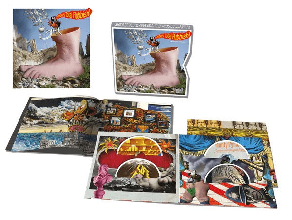 Image of Back Cover of 9xCD - EX/M - MONTY PYTHON, Monty Python s Total Rubbish - The Complete Collection (Virgin; 00 6025 378 468-5 6, Europe 2014, Box Set, Book, With 7"), Still SEALED In Stickered Shrinkwrap. Small Split On Corner Of Shrinkwrap.,  - 1516068C