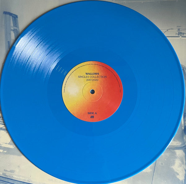 Image of Label Cover of LP - VG/VG+ - WALLOWS, Singles Collection 2017-2020 (Atlantic; 670852, US 2022, Inner, Stickered Outer Plastic Sleeve, RSD Limited Edition Blue Sky Vinyl), Light edge wear to sleeve and inner. Strong VG+ disc.,  - 1546087S