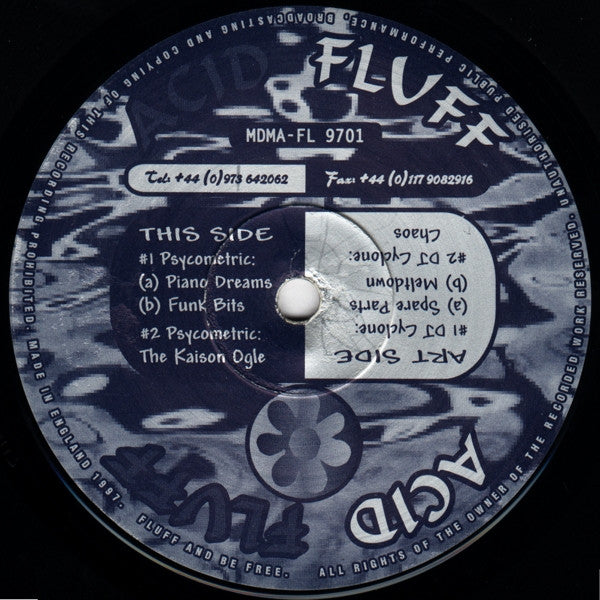 Image of Back Cover of 12" - G/VG - PSYCOMETRIC / DJ CYCLONE, Acid Fluff (Acid Fever Records; MDMA-FL 9701, UK 1997, Company Sleeve), Record has very slight warp. Sleeve damaged. dented and creased at edges and corners. Old ripped price sticker on there too, A1	DJ Cyclone   Spare PartsA2	DJ Cyclone   MeltdownA3	DJ Cyclone   ChaosB1	Psycometric   Piano DreamsB2	Psycometric   Funk BitsB3	Psycometric   The Kaison Ogle - 1516273C