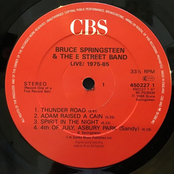 Image of Label Cover of 5xLP - VG/VG - BRUCE SPRINGSTEEN & THE E STREET BAND, Live / 1975-85 (CBS Red Labels With Walking Eye Logo In Either Rim Text Or At Bottom Depending On Side; 450227 1, UK 1986, Stickered Box Set, 5 Inners & Booklet), Small bit of fogging on Side 5, does not effect play.,  - 3116121C