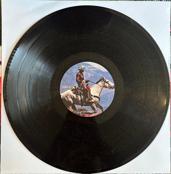 Image of Label Cover of LP - NEW/NEW - THE STROKES, Reality Awaits (Sony; 19958455271, UK 2026, Black Ice Glitter Vinyl), , Produced by Rick Rubin, Reality Awaits is the 7th album from The Strokes. Full track list includes nine new songs   set for release on June 26. - 3056049S
