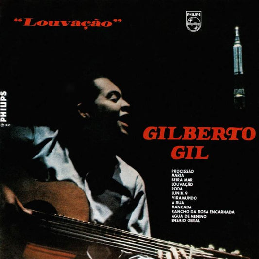 Image of Front Cover of LP - NEW/NEW - GILBERTO GIL, Louva  o (Verve; 5540393, UK 2026 Reissue, Red Vinyl), , Gilberto Gil s debut album Louva  o was released in 1967 on Philips Records. Arriving on the eve of Tropicalismo, the record places Gil s guitar at the center of rich arrangements by Carlos Monteiro de Souza, Dori Caymmi, and Leonardo Bruno. Blending samba, bossa nova, carnival traditions, and Northeastern Brazilian rhythms, the album explores social, political, and religious themes. - 2916217C