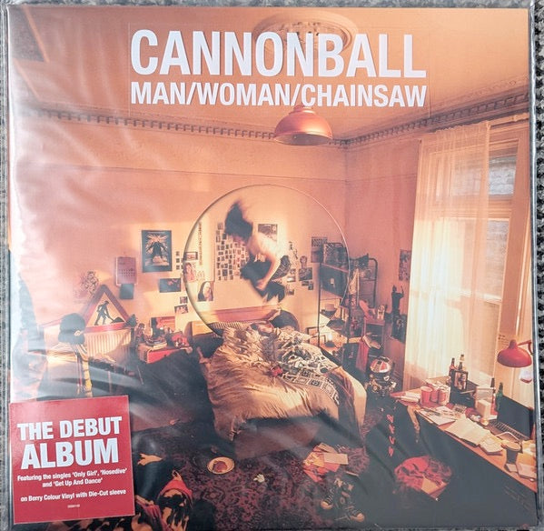 Image of Front Cover of LP - NEW/NEW - MAN/WOMAN/CHAINSAW, Cannonball (Fiction Records; 5030140, UK 2026, Indie Exclusive Limited Edition 140g Berry Vinyl with Die-Cut Sleeve, Printed Inner, and Hype Sticker. ), ,  Cannonball  is the highly anticipated debut album from Man/Woman/Chainsaw. Produced by Margo Broom (Fat White Family, Big Joanie), and Seth Evans (Geordie Greep, Black Midi), it includes the singles  Only Girl , and  Nosedive . Grand and exuberant, rich with unconventional structures and world-be
