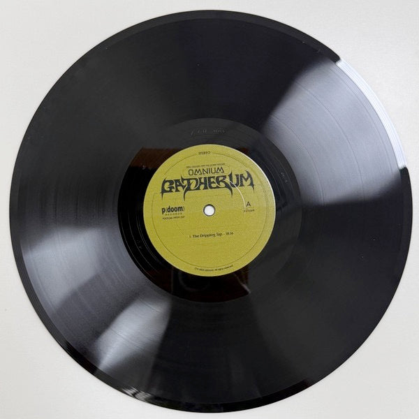 Image of Label Cover of 2xLP - NEW/NEW - KING GIZZARD & THE LIZARD WIZARD, Omnium Gatherum (p(doom) records; 8704714931, Europe 2025 Reissue, Gatefold, Cardboard Outer, Inner), ,  Omnium Gatherum  s sprawling 16 tracks ofgonzoid prog jams, dizzying pop nuggets, rubberlegged hip-hop odysseys and passages of purethrash metal abandon offer plenty for Gizzard fansand neophytes alike to chew on. Typically, Gizzardalbums pursue a single theme or style - but part ofthe thrill of  Omnium Gatherum  for the group was