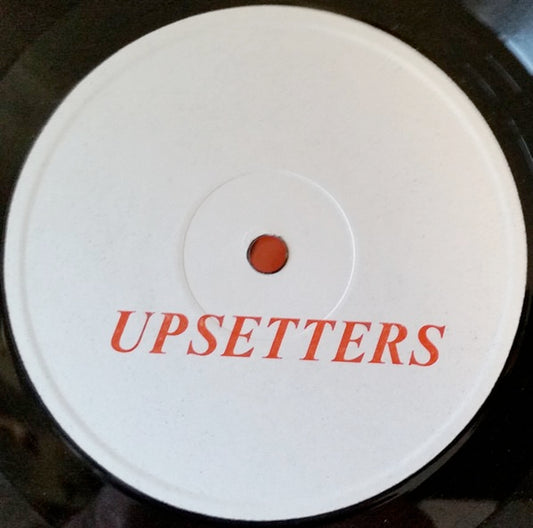 Image of Front Cover of LP - /G - LEE PERRY & THE UPSETTERS, Musical Bones (Dip; DLP 6000, UK 1975, Plain Sleeve, Matrix : DLP 6000), Covered in marks and scuffs, does not skip on our system. Crackle and occasional pops/ticks here and there. Groove wear. Labels have been blacked out, and covered with white labels on both sides., A1	Coco-MaccaA2	Fly AwayA3	The MessageA4	Licky-LickyA5	LabrishB1	Quinge-UpB2	Raw-ChawB3	5 Cardiff CrescentB4	Four Of A KindB5	Voodoo Man - 1816154C