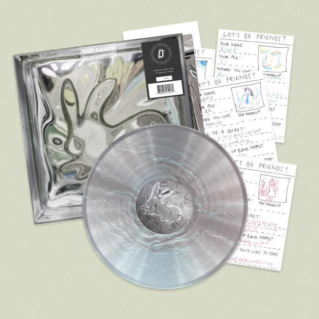 Image of Front Cover of LP - NEW/NEW - 1000 RABBITS, Are we friends yet? - DINKED EDITION (YOUNG; YO504TE, UK 2026,  Pearl lagoon  colour vinyl, Set of 5 A5 friendship forms, 1 blank friendship form and instructions, Numbered edition, Limited pressing of 500, Dinked Edition Number: 409), ,  - 2936129E