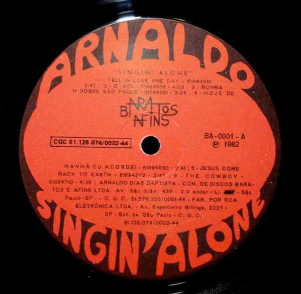 Image of Label Cover of LP - VG/VG+ - ARNALDO, Singin' Alone (Baratos Afins; BA0001, Brazil 1982), Disc is very clean - strong VG+. Sleeve has some light creases and edge wear.,  - 1816467C