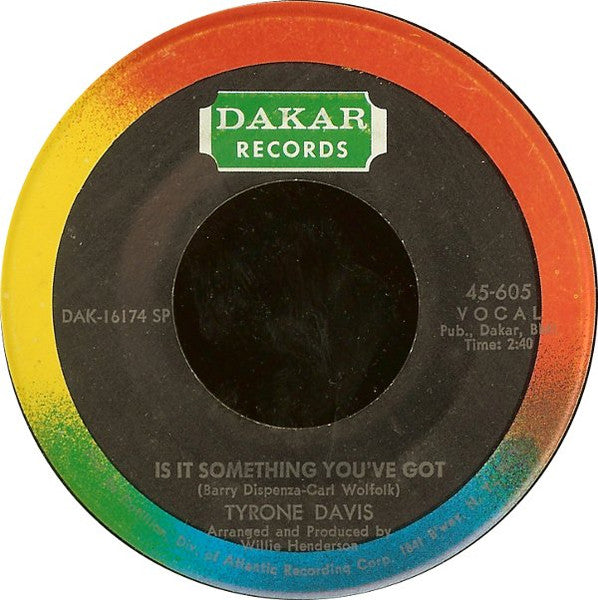 Image of Front Cover of 7" - /G+ - TYRONE DAVIS, Is It Something You've Got / Undying Love (Dakar Records; 45-605, US 1969), Record has marks and groove wear. Lots of writing all over A-side label in marker pen (and into run-out). Drill hole,  - 1816494C