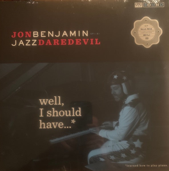 Image of Front Cover of LP - VG+/VG+ - JON BENJAMIN "JAZZ DAREDEVIL", Well, I Should Have... (Learned How To Play Piano) (Sub Pop; SP1151, US 2015), Sleeve still in opened shrinkwrap with hype sticker, very light ring wear. Vinyl has a couple of light cosmetic marks that don't effect play., Known for his performances in roles such as Bob Belcher in Bob's Burgers, and Sterling Archer in Archer. Benjamin released this jazz album featuring himself on piano, despite not knowing how to play the instrument. - 191