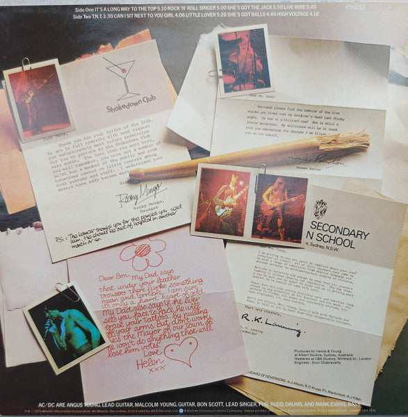 Image of Back Cover of LP - G+/G+ - AC/DC, High Voltage (Atlantic Green & Orange With W In Rim Text; K 50257, UK 1970s Reissue, Arun/Strawberry Matrices), PLays fine throughout but has some long light marks and a couple of circular marks, Sleeve intact but heavy spine wear. ,  - 1916188C