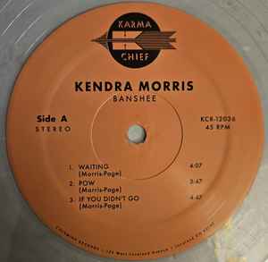 Image of Label Cover of 2xLP - NEW/NEW - KENDRA MORRIS, Banshee (Karma Chief Records; KCR12036, US 2024, Gatefold, Gold Swirl vinyl), + "Fine Right Here / Birthday Song" Personalised Test Pressing 7" Colemine Logo Sticker,  - 1936039E