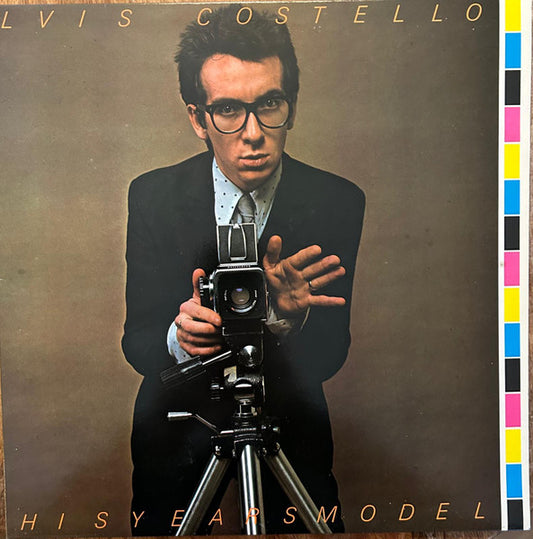 Image of Front Cover of LP - VG/VG - ELVIS COSTELLO & THE ATTRACTIONS, This Year's Model (Radar Records; RAD 3, UK 1978, Offset cover astwork, Inner, A - EG/Moira, B - EG/Porky), This copy has copyright info on one line.,  - 2026007E