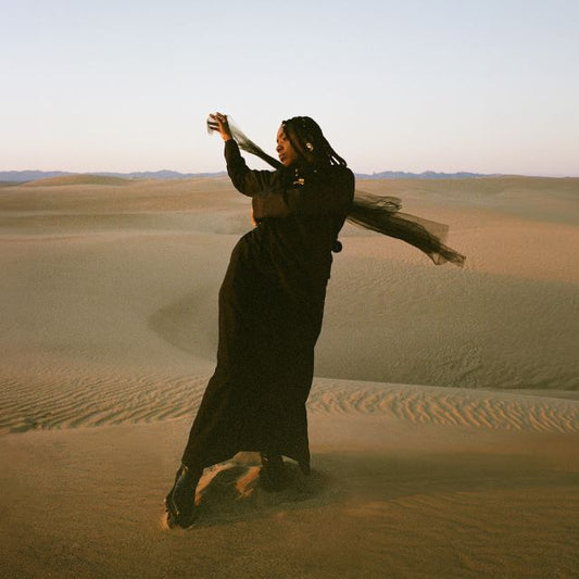 Image of Front Cover of LP - NEW/NEW - DUA SALEH, Of Earth & Wires (Ghostly International; GI476LP-C1, Europe 2026, Blue Sapphire Vinyl), , Sudanese-American artist Dua Saleh continues their boundless ascent with Of Earth & Wires, a resolutely warm, spiritual, and frenetic album exploring notions of home, humanity, and renewal.Featuring contributions from Justin Vernon (Bon Iver), aja monet, Gaidaa, and more, Saleh threads and deconstructs indie, R&B, and electronic pop with flashes of Sudanese folk, UK d