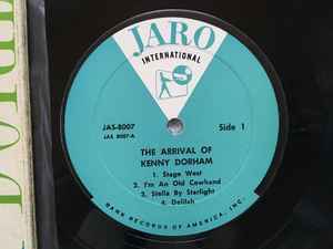Image of Label Cover of LP - VG/G+ - KENNY DORHAM, The Arrival Of Kenny Dorham (Jaro International; JAS 8007, US 1960, Laminated Front Pasteback Sleeve, Stereo), Hairlines & scuffs, No Jaro Company Inner, edge wear, tape mark on opening edge. Record has a few pops and light surface noise in quiet parts.,  - 2046107S