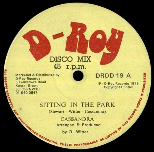 Image of Front Cover of 12" - VG/G+ - CASSANDRA, Sitting In The Park / Hyde Park Dub (D-Roy; DRDD19, UK 1979, Reggae Disco 45 Sleeve), Lots of light marks, plays strong VG. WOL.,  - 2016377C