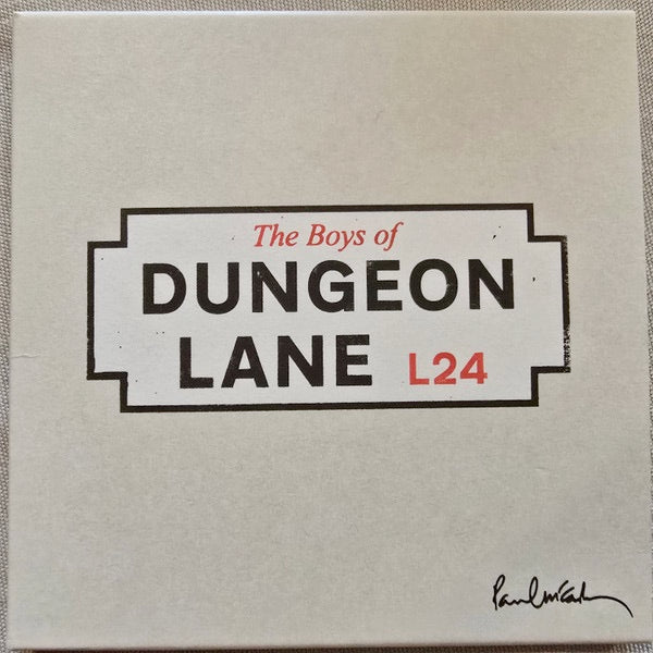 Image of Front Cover of CD - NEW/NEW - PAUL MCCARTNEY, The Boys of Dungeon Lane (EMI; 5724860, Europe 2026, Card Sleeve), , 'The Boys of Dungeon Lane' is a collection of rare and revealing glimpses into memories never-before shared, along with some newly inspired love songs, from one of the most culturally significant figures of our time. These extraordinary new songs find Paul writing with rare openness about his childhood in post-war Liverpool, the resilience of his parents, and early adventures shared wi