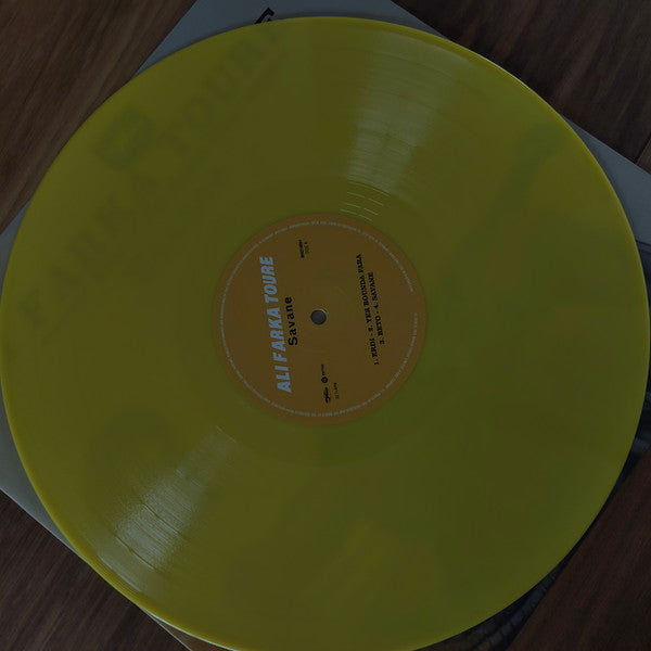 Image of Back Cover of 2xLP - NEW/NEW - ALI FARKA TOURE, Savane (20th Anniversary Edition) (BMG; 964218661, Europe 2026 Reissue, Gatefold, 16 Page Booklet, Yellow Vinyl), , Released in July 2006 via the World Circuit label, Savane was Ali Farka Tour  s final solo album, and a deeply resonant  farewell  work. Recorded in Bamako, Mali with his specially assembled down-home ngoni group, and often acclaimed as his finest album,  Savane  is both one of the most traditional and seemingly the most blues drenched  