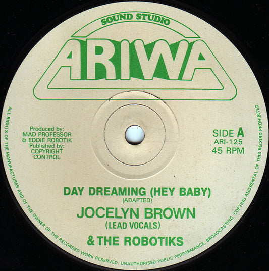 Image of Front Cover of 12" - G+/VG+ - JOCELYN BROWN & THE ROBOTIKS, Day Dreaming (Hey Baby) (Ariwa; ARI 125, UK 1990, Reggae Disco 45 sleeve), Wear to Reggae Disco sleeve with writing.,  - 2146178S